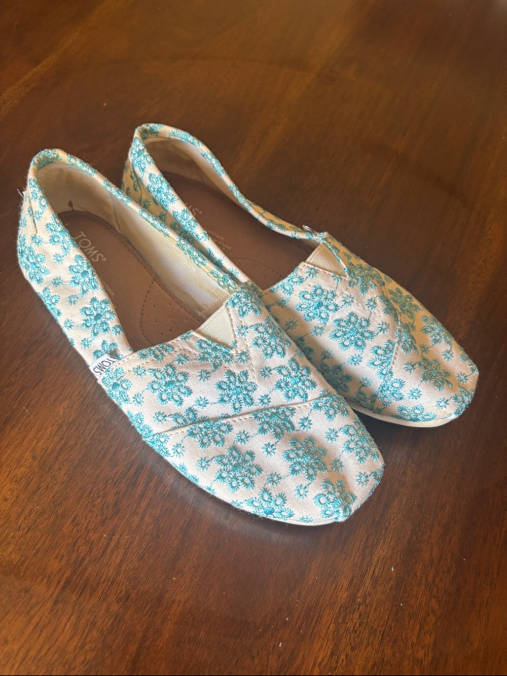 Toms Cream Slip-On Flats with Teal Floral Pattern